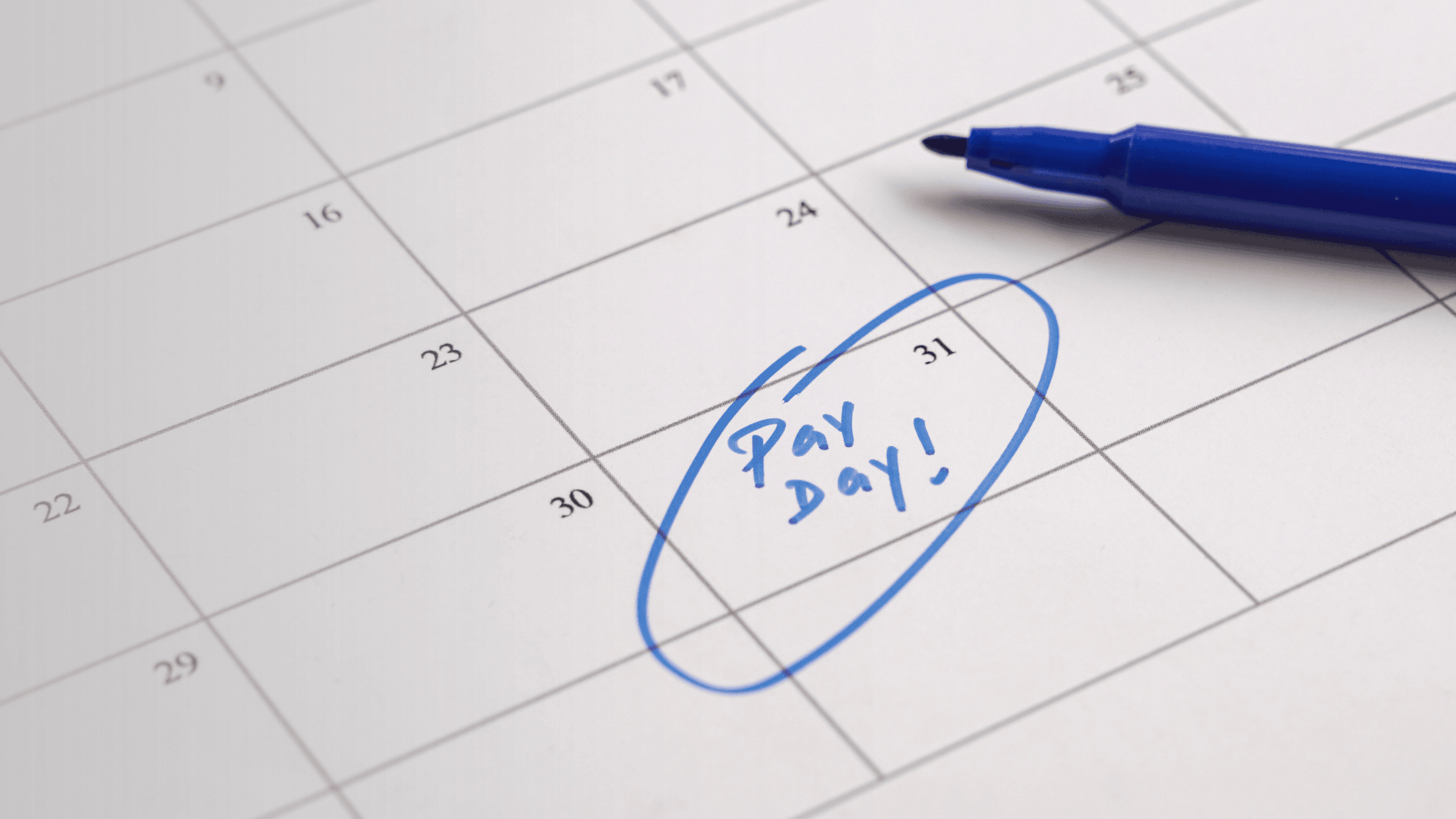 The image shows a close-up of a calendar with the date 31 circled in blue and the words 